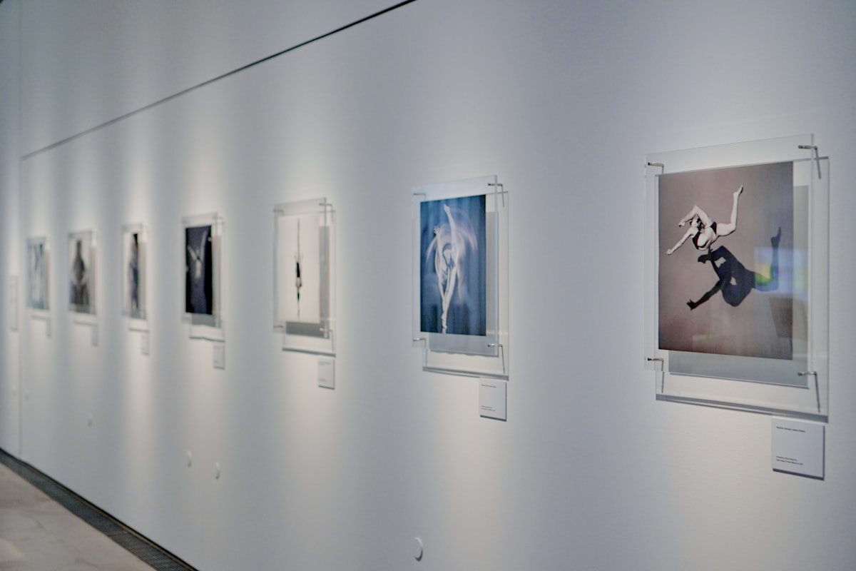 Framed artworks displayed in a quiet gallery